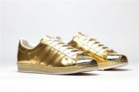 sapato adidas original dourada